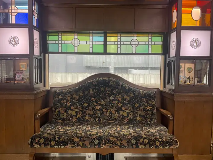 Lounge couch inside the JR Kyushu A train