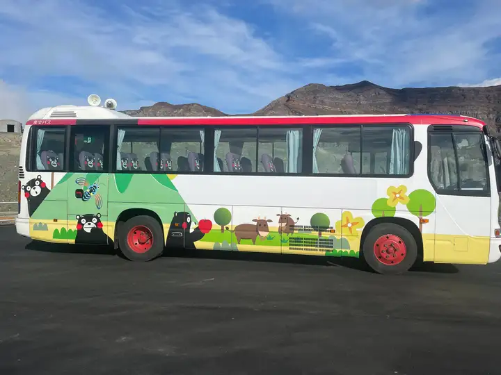 Kumamon on tourst bus at Aso crater